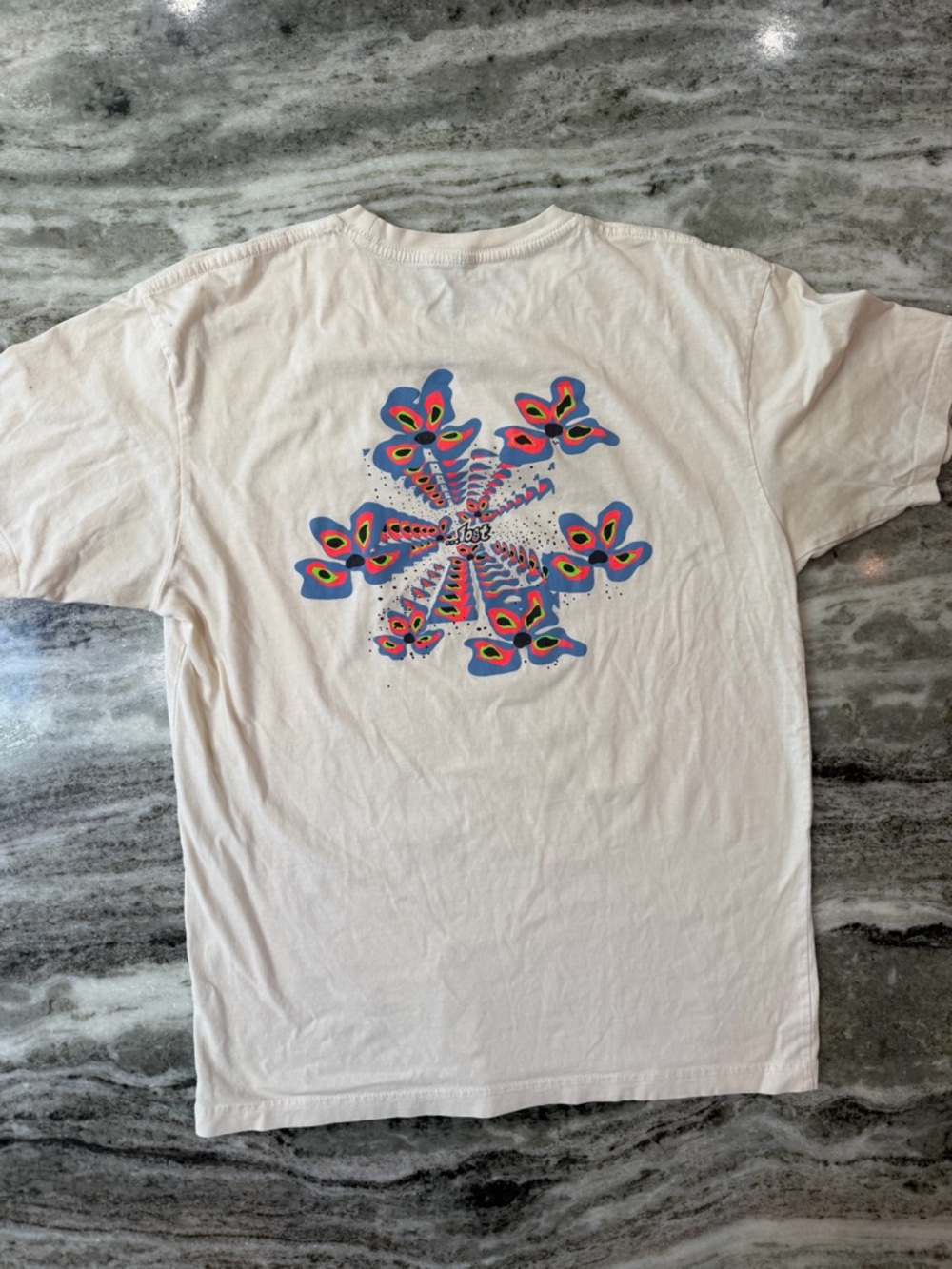 LOST Brand Men's White Graphic Tee
Size Large
100% Cotton